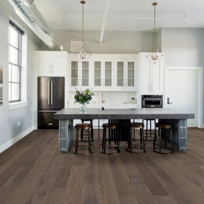 dark stained hardwood floors in a bright Abbotsford kitchen
